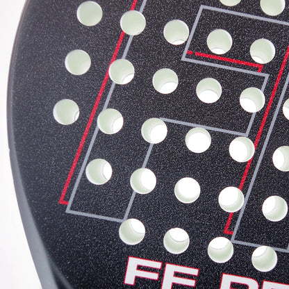 Close-up of the Karakal FF Pro 375 Padel Racket by Karakal, featuring a black surface with red geometric lines and round holes, designed for advanced players who want precision in spin shots; partial white branding appears at the bottom.