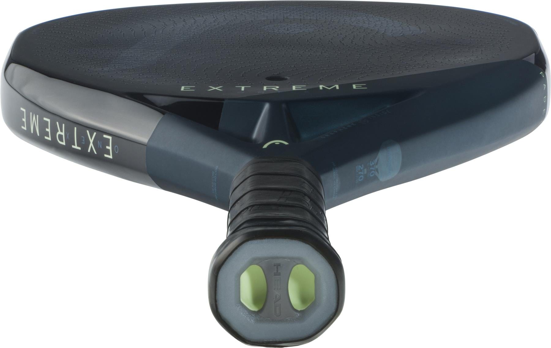 Close-up of the HEAD Extreme One X 2025 Padel Racket, featuring visible "EXTREME" branding and a textured 12K Carbon Fibre surface on the handle for enhanced performance.