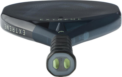Close-up of the HEAD Extreme One X 2025 Padel Racket, featuring visible "EXTREME" branding and a textured 12K Carbon Fibre surface on the handle for enhanced performance.