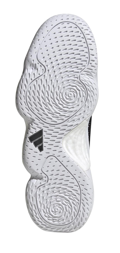 The image features the sole of an ADIDAS Stabil 16 Mens Padel Shoe. It displays intricate patterns with circular grooves and lines, a black adidas logo near the center, and is enhanced with a BOOST midsole for superior comfort.