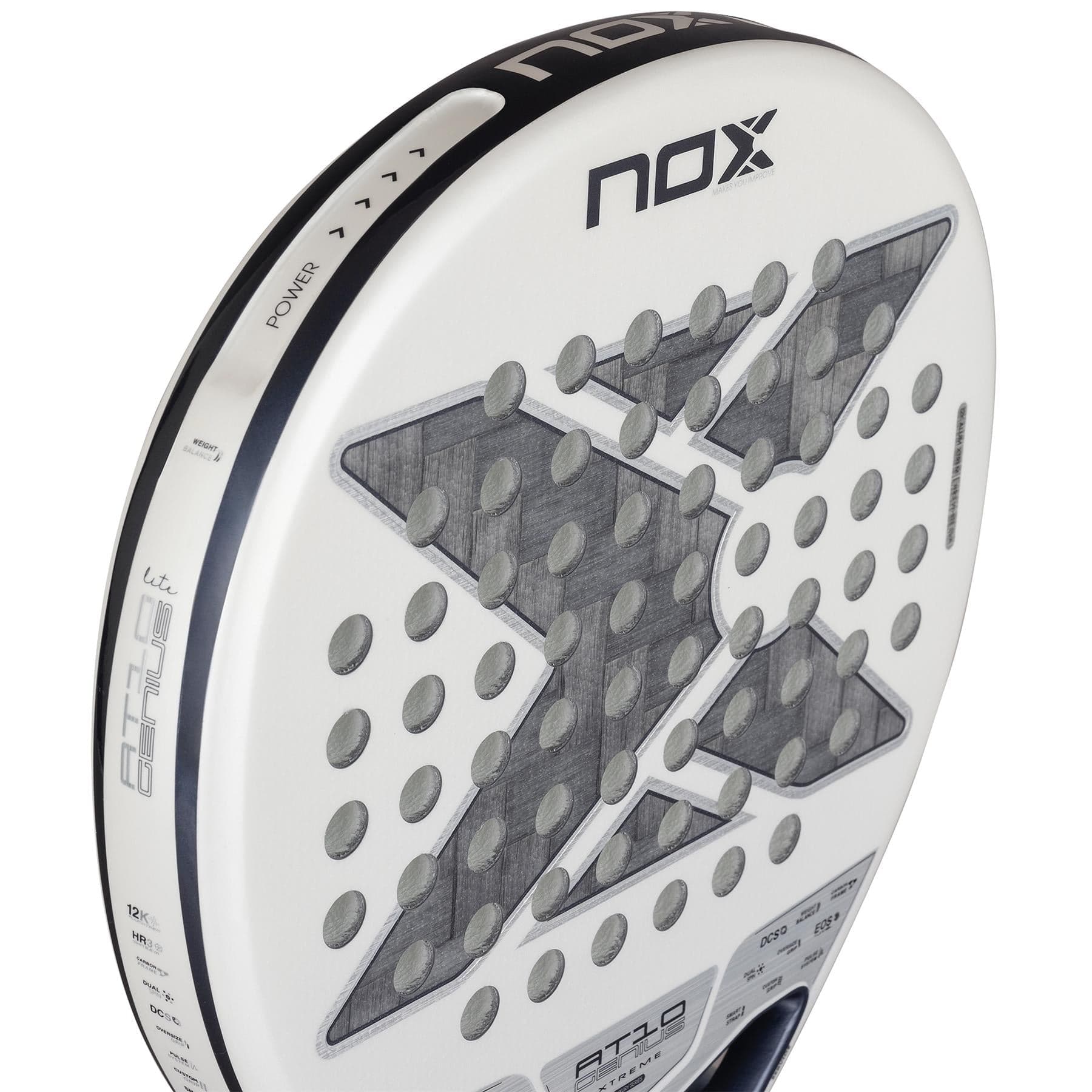 Close-up of the NOX AT10 Genius 12K Alum Extrem Lite By Agustín Tapia 2026 padel racket, featuring a white design with a large X-shape, gray accents, circular holes, "POWER" printed on the edge, and Weight Balance system for optimal play.