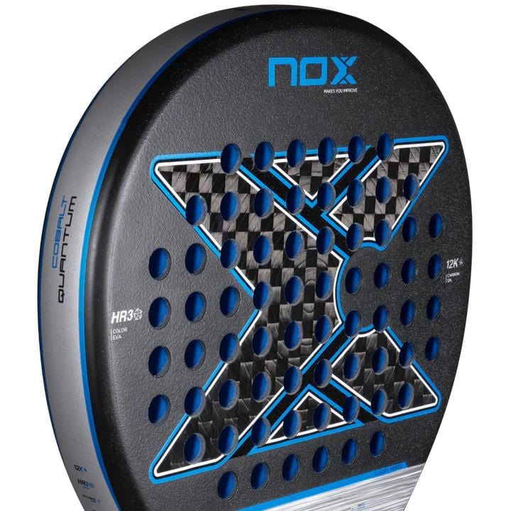 Close-up of the NOX Luxury Quantum 12K Cobalt 2025 Padel Racket, with a bold blue “X”, round perforations, sleek NOX branding on black and silver 12K carbon fibre, and "COBALT QUANTUM" along the side.