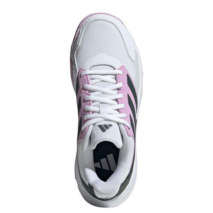 Here is a revised version of the sentence using the given product data:

The ADIDAS CourtJam Control 3 women's all court shoes showcase a top view featuring a bronze strata mesh upper with bliss lilac accents on the sides, combined with legend ink stripes in a lace-up design. These adidas sneakers offer a sporty aesthetic, complete with a cushioned tongue bearing the logo, and are crafted from recycled materials for an eco-conscious style.