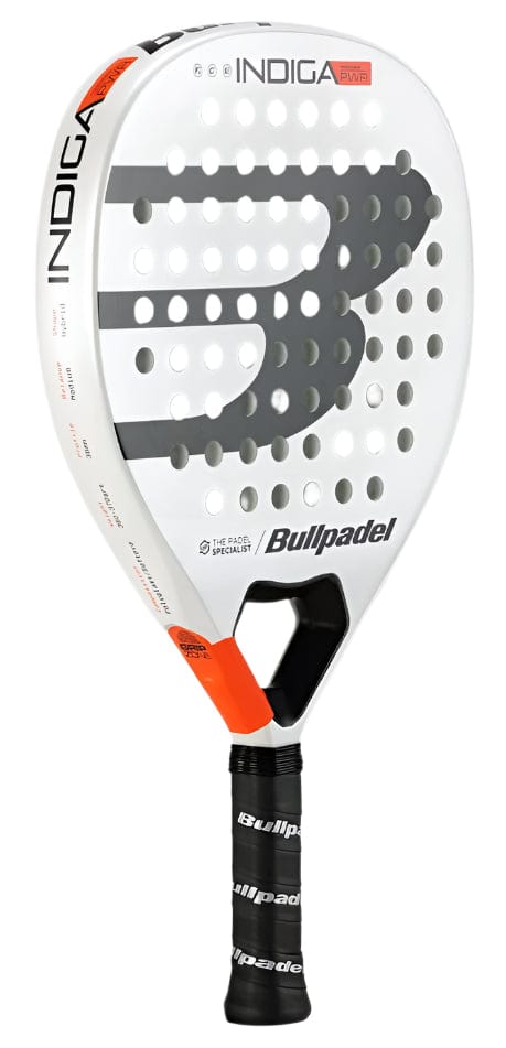 The Bullpadel Indiga Pwr 2025 Padel Racket features a large "B" logo, black perforations, an orange accent by the handle, and Bullpadel branding—ideal for players wanting a powerful white racket.