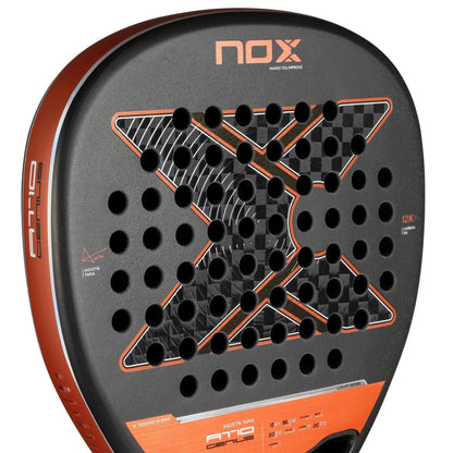 Close-up of the NOX AT10 Luxury Genius Attack 12K By Agustin Tapia 2025 Padel Racket, showcasing its bold black "X," red edges, and signature branding elements that reflect Agustin Tapia’s unique style.