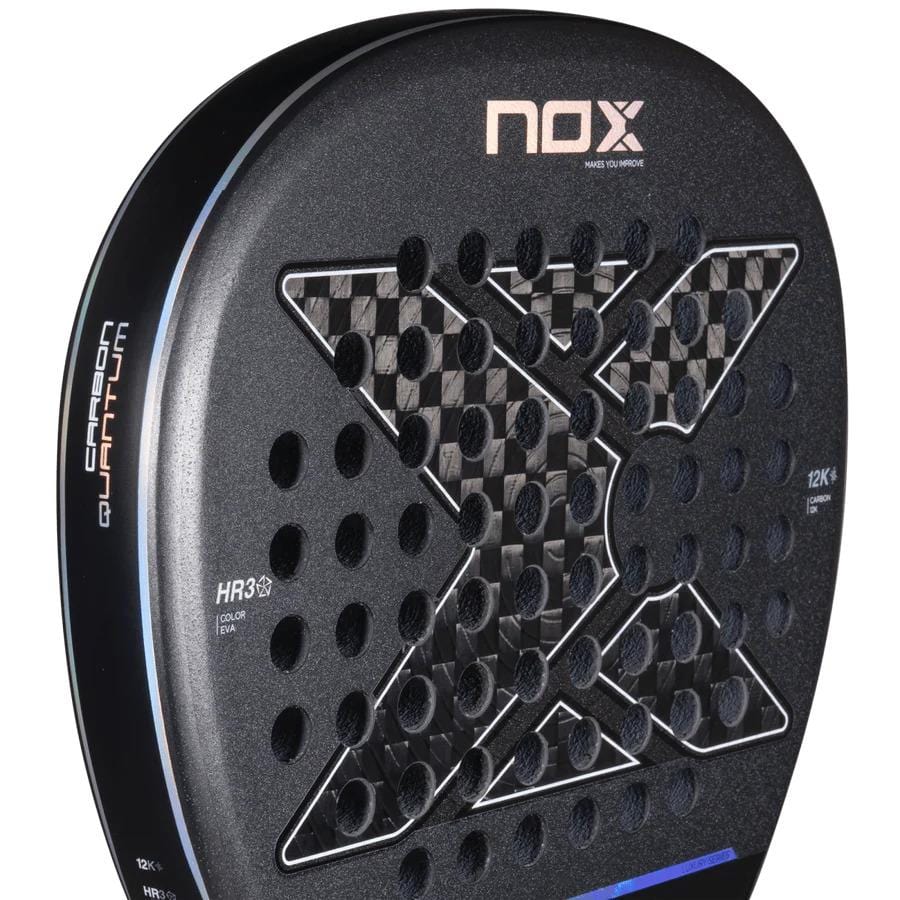 Close-up of the NOX Luxury Quantum 12K Carbon 2025 Padel Racket, highlighting its black 12K carbon fiber surface, perforated holes, central "X" design, plus "Carbon quantum," HR3 core, and Exclusive Spin technology on the side.