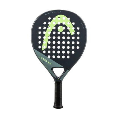 The HEAD Evo Extreme 2023 Padel Racket by HEAD features Innegra technology, a black frame with circular holes, a vibrant green and yellow curved design, “EXTREME” on the side, and a black handle with grip tape.