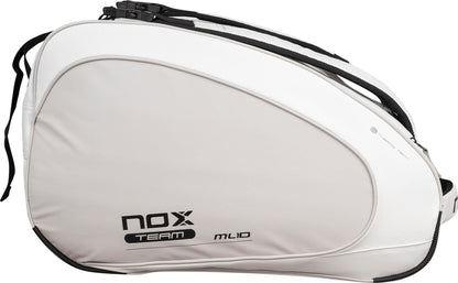 The NOX ML10 Team Padel Racket Bag in white and grey features black zippers and straps, designed for carrying rackets or sports gear. Shown from the side, it’s a stylish choice from NOX for athletes on the go.