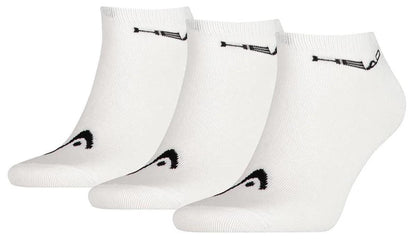 The HEAD Sneaker Padel Socks (3 Pack) in white/black are crafted from a soft cotton blend for ultimate comfort. They feature a small black HEAD logo near the top and chic black detailing near the toes, showcased side by side on a pristine white background.