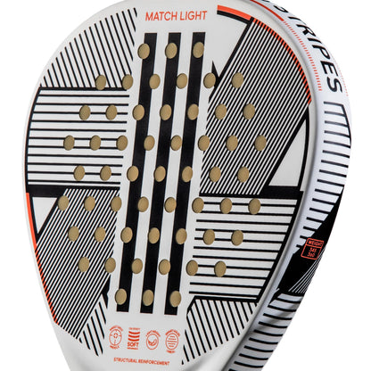 Close-up of the adidas Match Light 3.3 Padel Racket, featuring a lightweight design with a white base, black geometric lines, small round holes, and orange accents. adidas branding and icons appear near the handle.