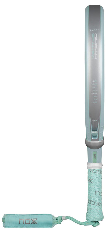 The NOX Luxury Ventus 12K Hybrid Lite 2026 padel racket features a teal and silver design, long handle, textured grip, "NOX" branding, Venus Head flat surface with specs displayed, and durable 12K carbon fibre construction.