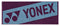 The Yonex AC1113EX Padel Sports Towel - Bordeaux is a rectangular cotton towel with the Yonex logo and name in bold letters on a contrasting two-tone blue and dark purple background, creating an eye-catching design.