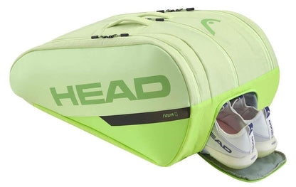 The HEAD Tour Padel Racket Bag L - SG in light green features climate control, a zippered side compartment with white HEAD tennis shoes visible, bold "HEAD" branding, and a top handle.
