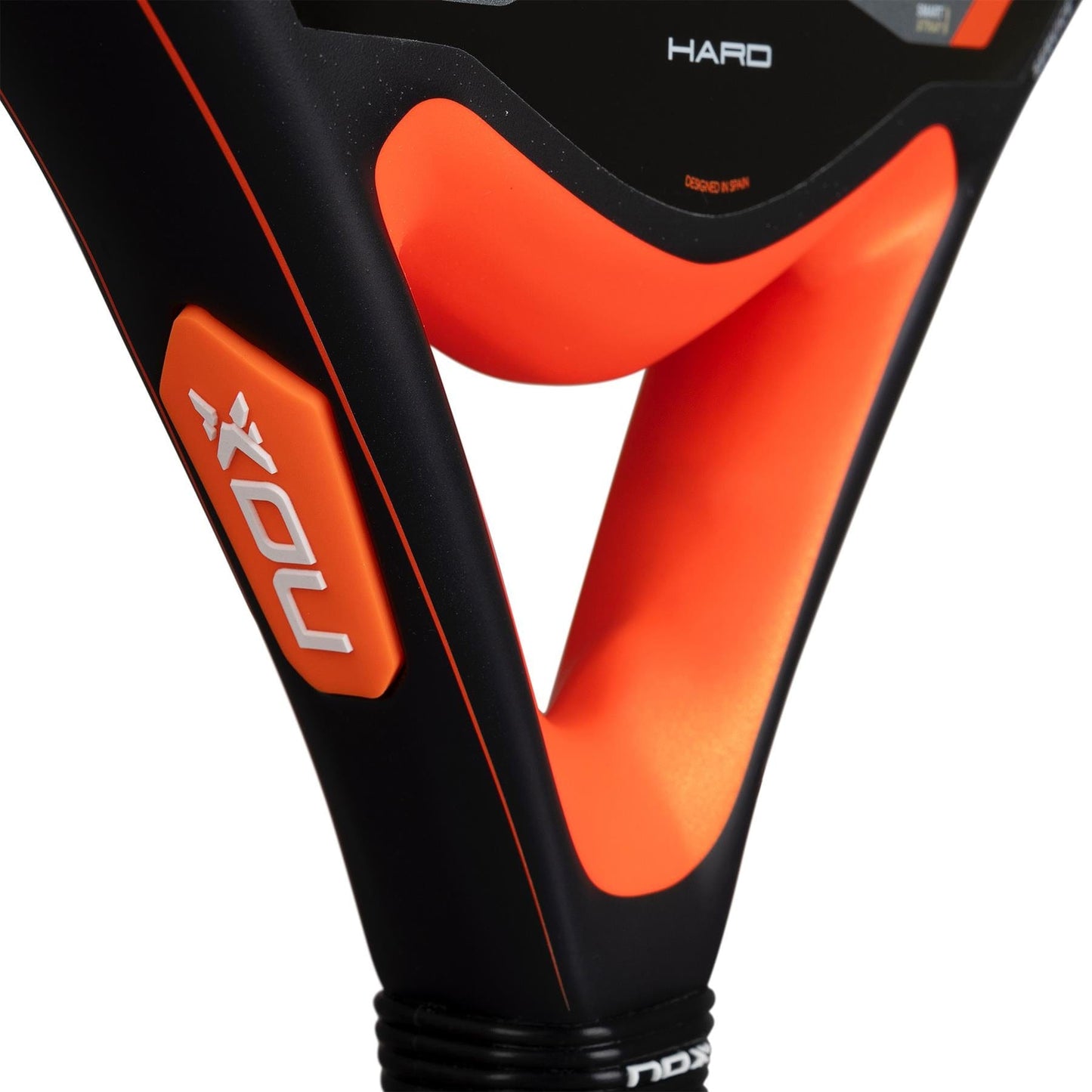 Close-up of the NOX Equation Hard Advanced 2026 Padel Racket, focusing on the handle and textured frame labeled "HARD," featuring an anti-vibration system by NOX for enhanced comfort.