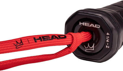 Close-up of a black handle with a red wrist strap, both showing the HEAD logo—highlighting Auxetic 2.0 technology, as featured in the HEAD Coello Team 2025 Padel Racket.