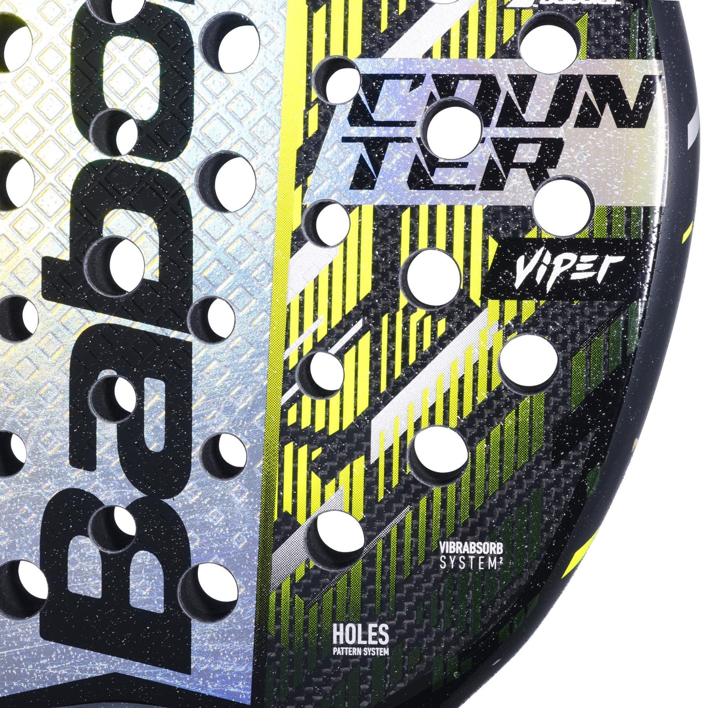 Close-up of the Babolat Counter Viper 2.5 Padel Racket, featuring a textured surface, circular holes, and "COUNTER VIPER," "VIBRASORB SYSTEM," and "HOLES PATTERN SYSTEM" text on a yellow, black, and silver design by Babolat.
