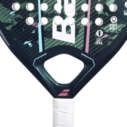 Close-up of the Babolat Reveal Padel Racket by Babolat—lightweight, with white grip tape and colorful geometric graphics. Features "Soft EVA" and "Hybrid" logos, making it an ideal padel racket for beginners.