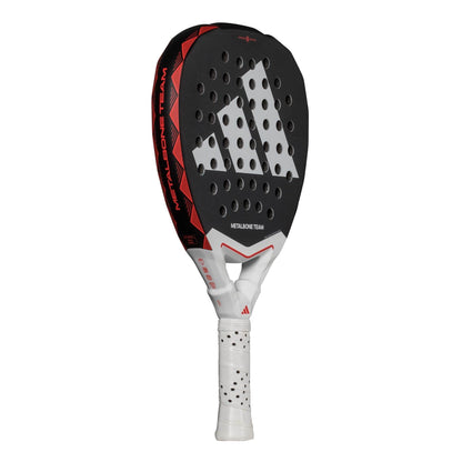 The adidas Metalbone Team 3.4 Padel Racket features a black, red, and white design with perforated face, bold diagonal stripes, "METALBONE TEAM" branding, and a white grip—perfect for aggressive court play.
