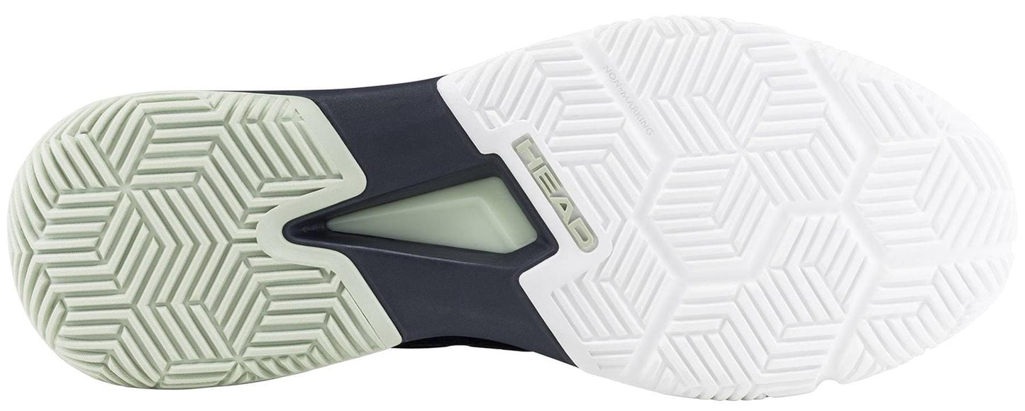 Close-up of the HEAD Motion Team 1.5 Mens Padel Shoes outsole in blue/green, showing a geometric tread pattern in white and light green rubber with "HEAD" embossed at the midfoot—ideal padel footwear from HEAD.