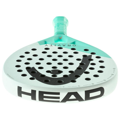 A close-up of the HEAD Gravity Motion 2024 Padel Racket highlights its advanced Spin Surface and innovative Auxetic 2.0 technology.