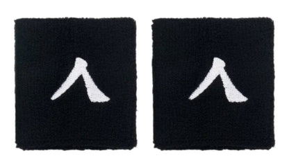The Kanso 7cm Wristband, made from absorbent fabric for optimal comfort, features two black wristbands with a white stylized logo, displayed side by side on a light gray background.