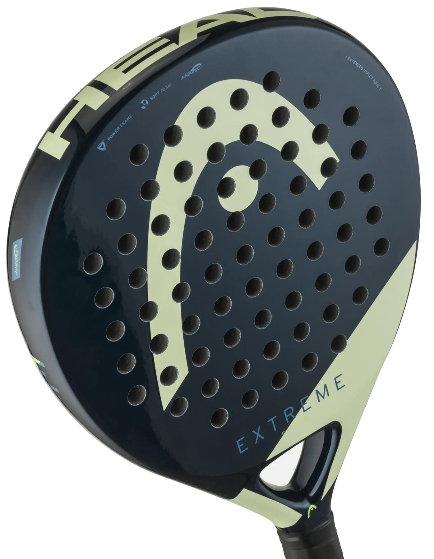 Close-up of the HEAD Evo Extreme 2025 Padel Racket, a comfortable black racket with light green accents and "EXTREME" lettering, designed by HEAD for beginners. Multiple round holes are visible on its surface.