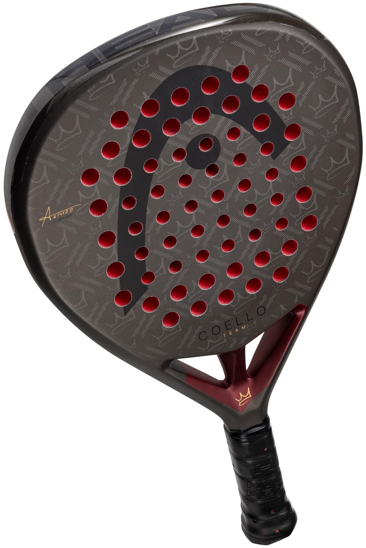 The HEAD Coello Team 2026 Padel Racket, from HEAD’s Arturo Coello collection, features a dark textured surface with red circular holes, a black grip handle, signature white and gold branding, and advanced Auxetic 2.0 technology.