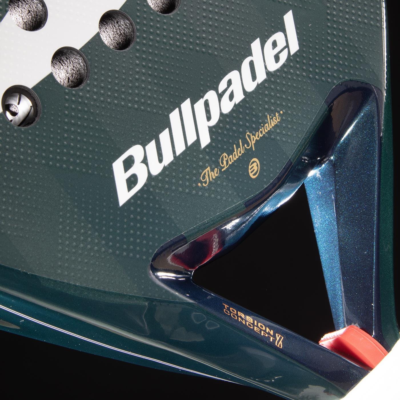 Close-up of the Bullpadel Icon 2026 Padel Racket, highlighting the Bullpadel logo, "The Padel Specialist" slogan, textured surface, gold "Core Carbon Concept" text on the frame—preferred by legend Juan Martín Díaz.