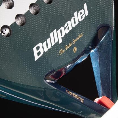 Close-up of the Bullpadel Icon 2026 Padel Racket, highlighting the Bullpadel logo, "The Padel Specialist" slogan, textured surface, gold "Core Carbon Concept" text on the frame—preferred by legend Juan Martín Díaz.