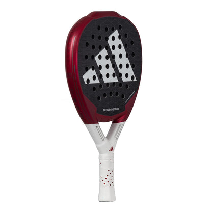 The adidas Metalbone Team 3.3 Padel Racket features a red, black, and white design with a large white adidas logo, Spin Blade Grit surface for control, and a white grip with red accents.