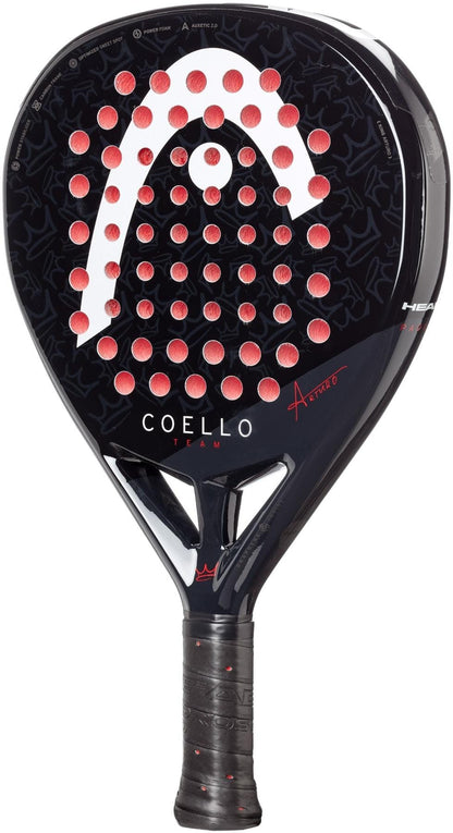 The HEAD Coello Team 2025 Padel Racket features a black and red design, large logo, multiple circular holes, and “Coello Team” branding. Enhanced with HEAD’s Auxetic 2.0 technology for outstanding performance.