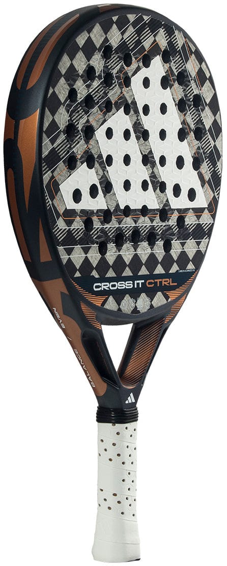 A close-up of the adidas Cross It Ctrl 2026 Padel Racket, featuring a black, brown, and white geometric design on carbon fibre, Spin Blade Mould texture, perforated face, and a white grip handle.