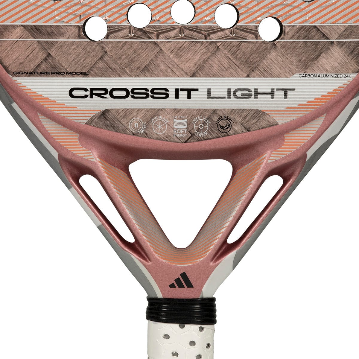 Close-up of the adidas Cross It Light 2026 Padel Racket’s center, showing its carbon fiber woven texture, ventilation holes, and white perforated grip. The adidas logo is visible near the handle.