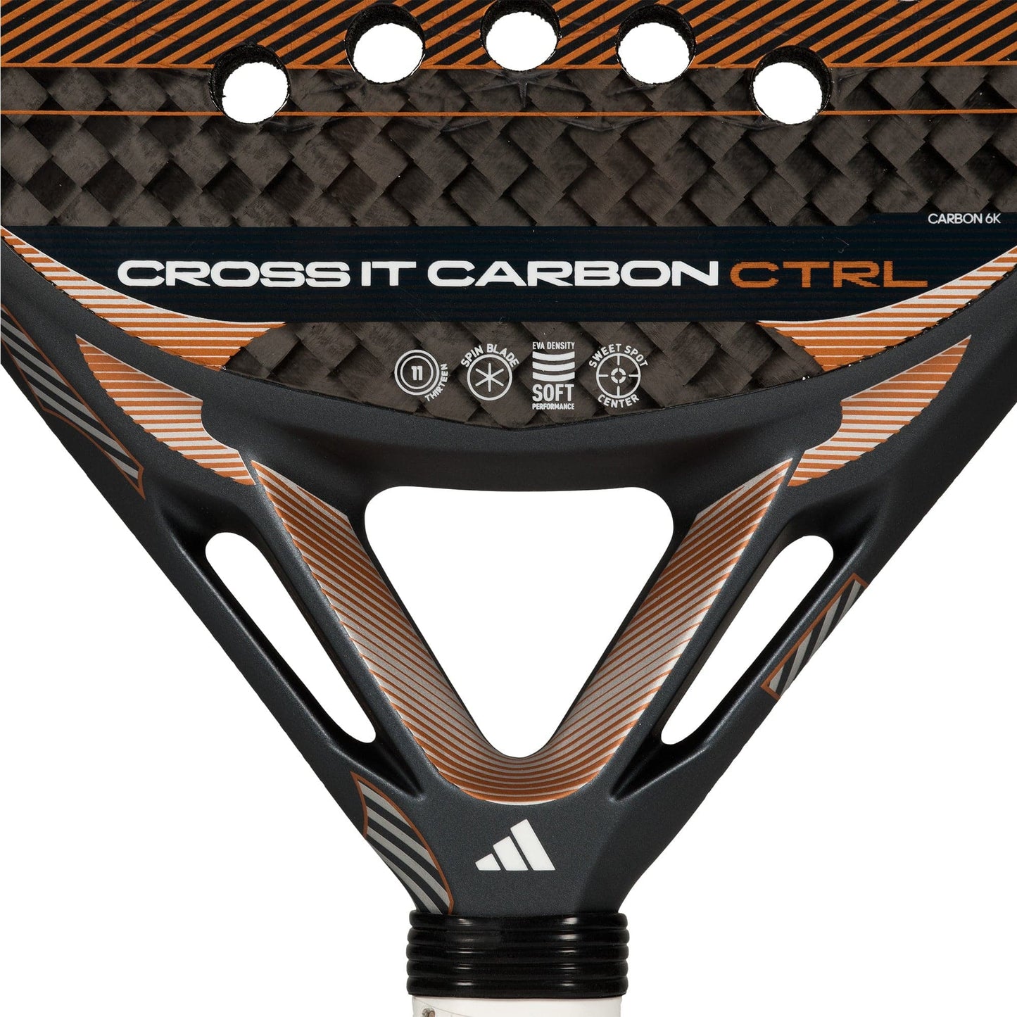 Close-up of the adidas Cross It Carbon Ctrl 2026 Padel Racket, featuring carbon fiber texture, "CROSS IT CARBON CTRL" text, adidas logo, and Extra Power Grip with performance icons on the racket face.