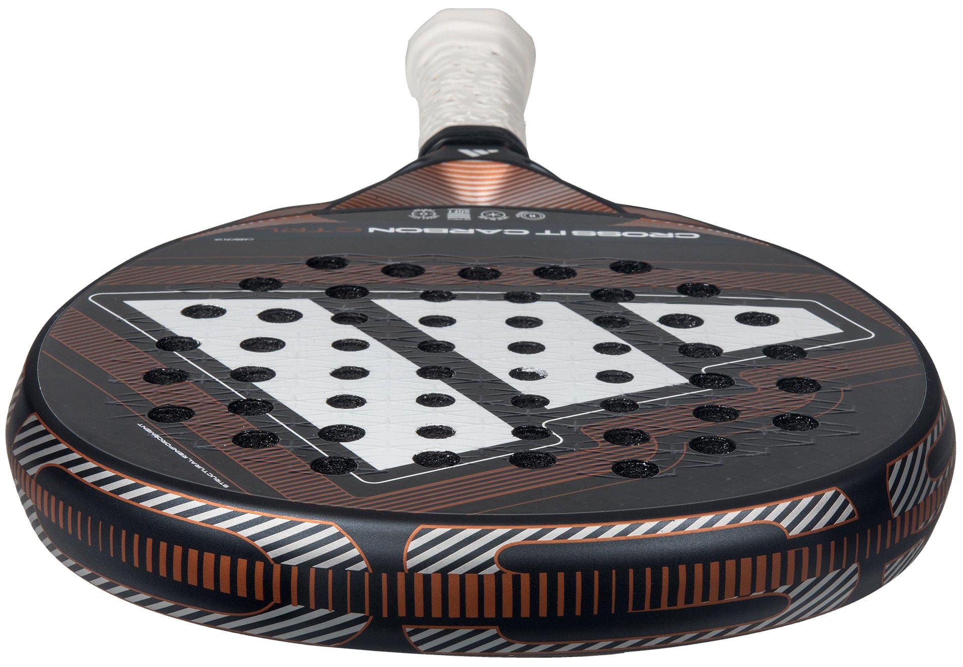 Close-up of the adidas Cross It Carbon Ctrl 2026 Padel Racket, showcasing its black and copper design, carbon fibre face with round perforations, and a white Extra Power Grip on the handle.