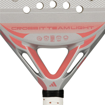 Close-up of the adidas Cross It Team Light 2026 Padel Racket, a lightweight racket with a white Extra Power Grip and silver and red branding, featuring the adidas logo on the handle and lower head.