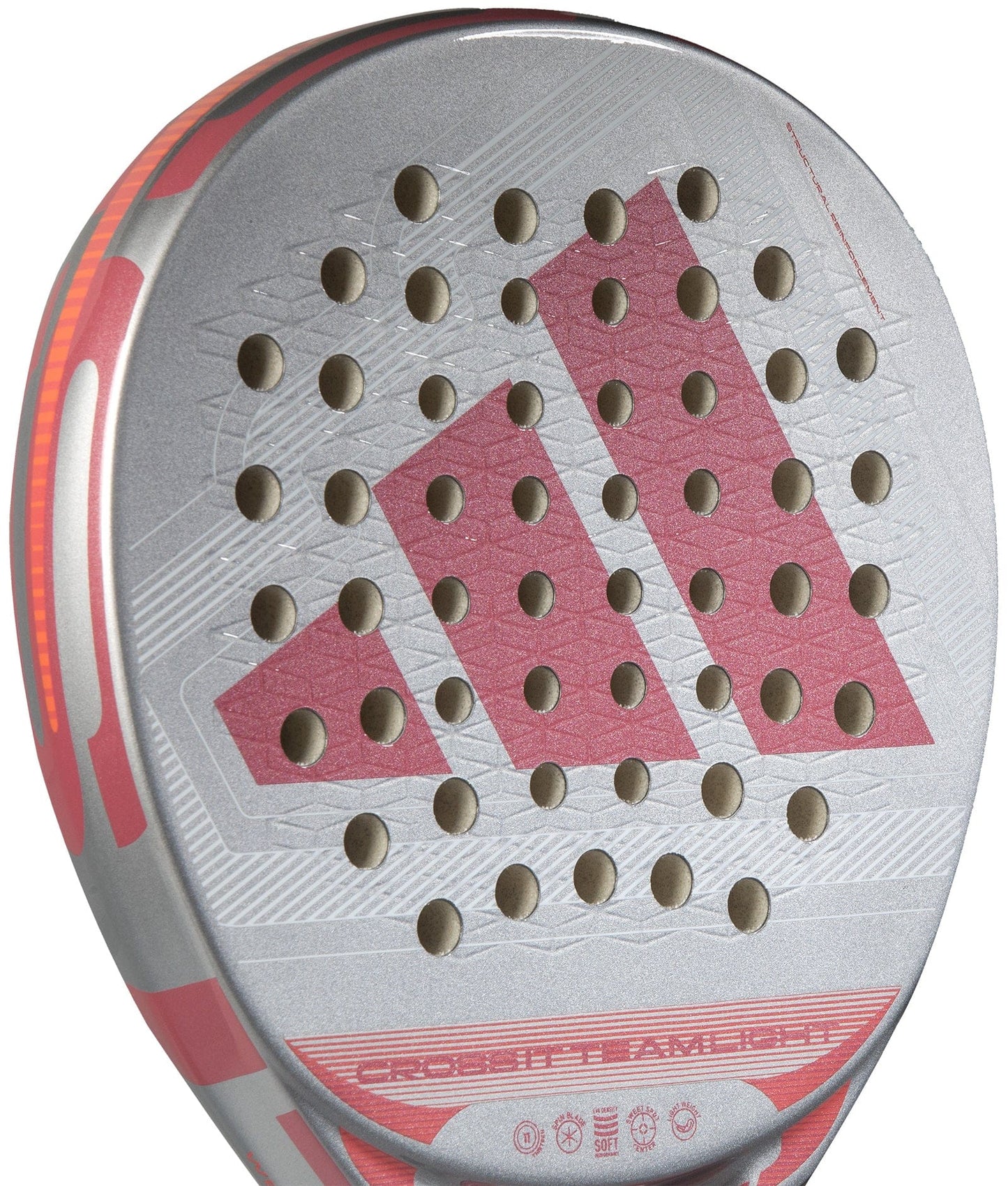 Close-up of the lightweight adidas Cross It Team Light 2026 Padel Racket in silver and red, showing a round hole pattern forming the adidas logo and an Extra Power Grip on the hitting surface.