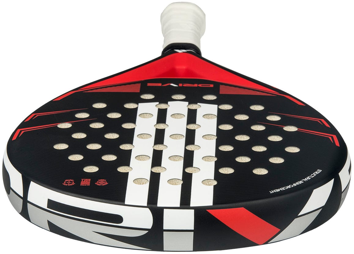 A close-up of the adidas ADIDAS Drive Black 2026 Padel Racket, a modern fibreglass racket in black, red, and white with circular perforations on the face and a white wrapped handle.