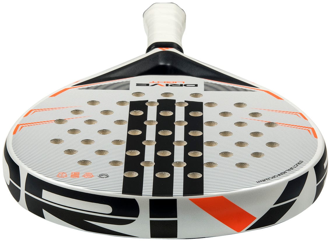 A close-up of the adidas Drive Light 2026 Padel Racket, a lightweight model featuring black and orange accents, circular perforations, and "DRIVE" on the face, seen from the handle end.