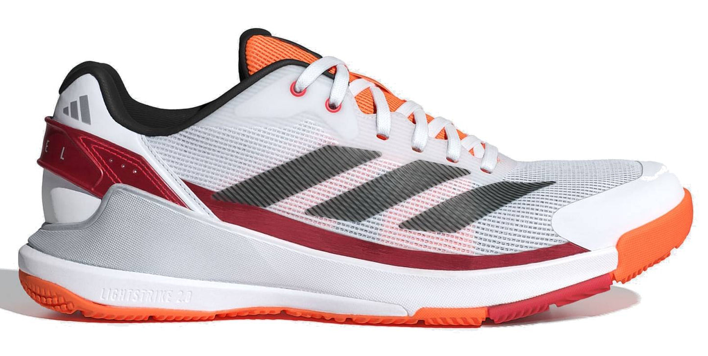 The adidas Crazyquick LS Mens Padel Shoes - White / Orange feature a mesh upper, lace-up design, multi-directional grip, orange sole, and small adidas logo near the heel with black stripes and red/orange accents.