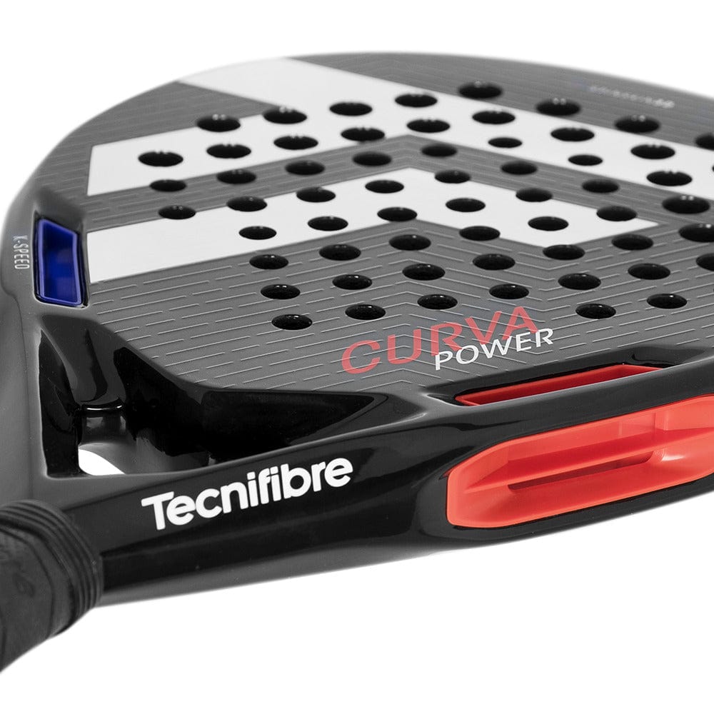 Close-up of the Tecnifibre Curva Power Padel Racket by Tecnifibre, showing its 18K carbon face with white diagonal stripes, red and blue highlights, "CURVE POWER" on the frame, and multiple circular holes on the black surface.