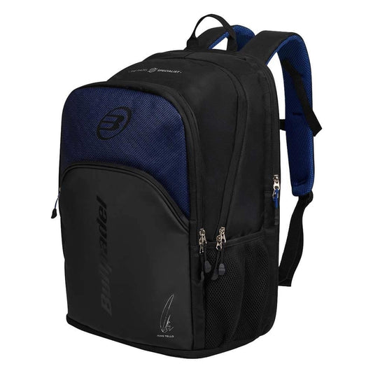 The Bullpadel BPM26008 Vertex Padel Backpack - Geo Blue features multiple zippered compartments, side mesh pockets, padded shoulder straps, the Bullpadel logo, and a Bea González-inspired graphic on the front.