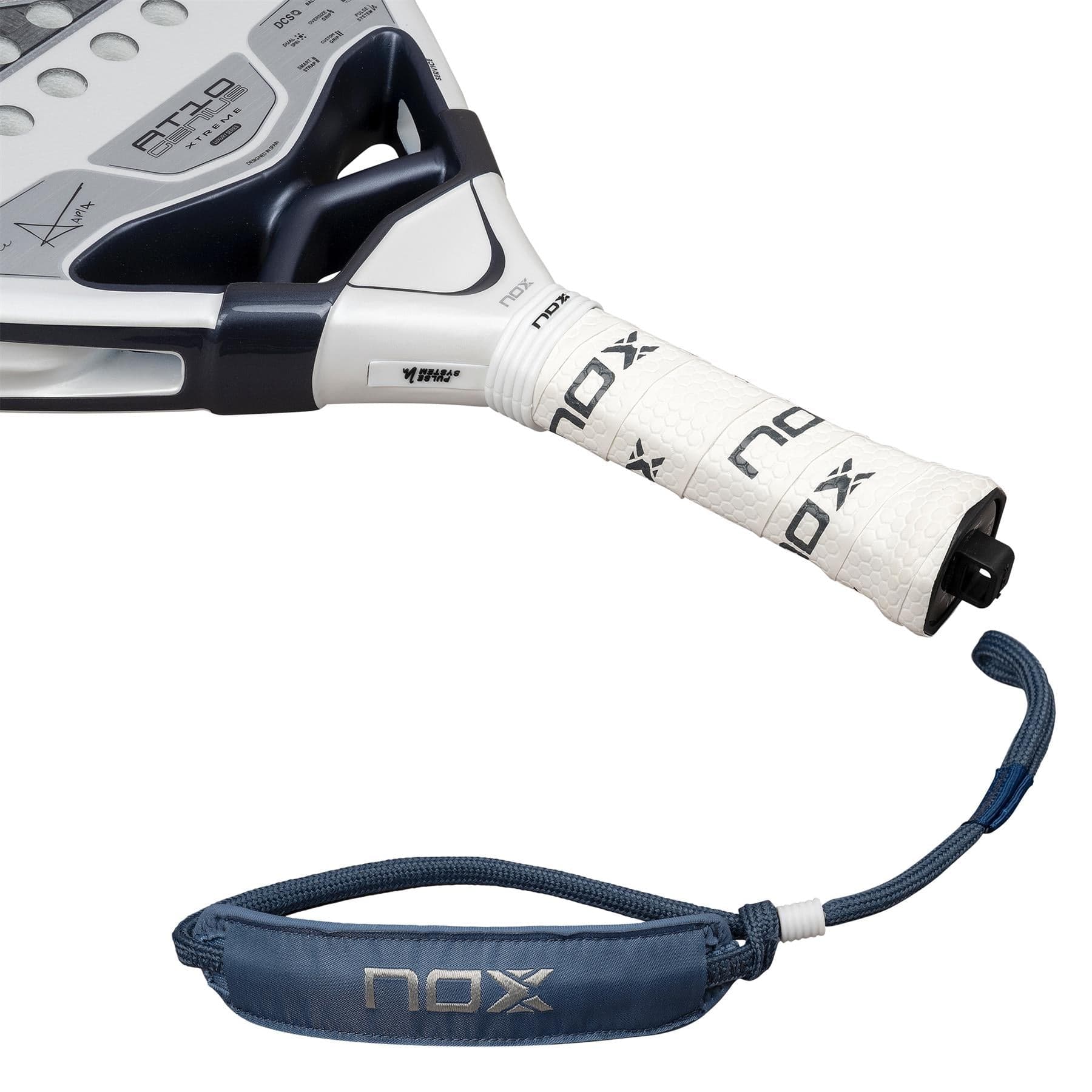 Close-up of a NOX AT10 Genius 12K Alum Extrem Lite By Agustín Tapia 2026 padel racket handle with white grip, black logo, detachable blue NOX wrist strap, and advanced Weight Balance system on a white background.