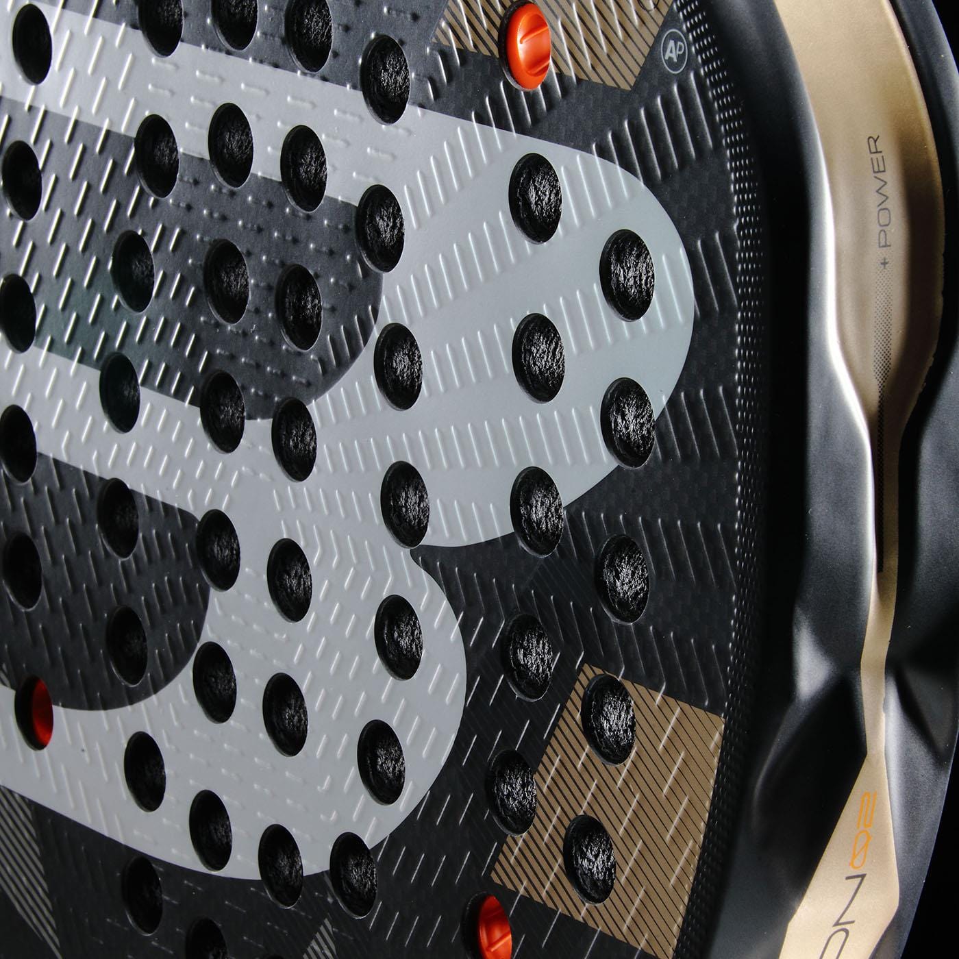 Close-up of the Bullpadel Neuron 02 2026 Padel Racket face, highlighting its textured surface, oval holes, and "POWER" detail on the frame—ideal for players seeking advanced Bullpadel performance.