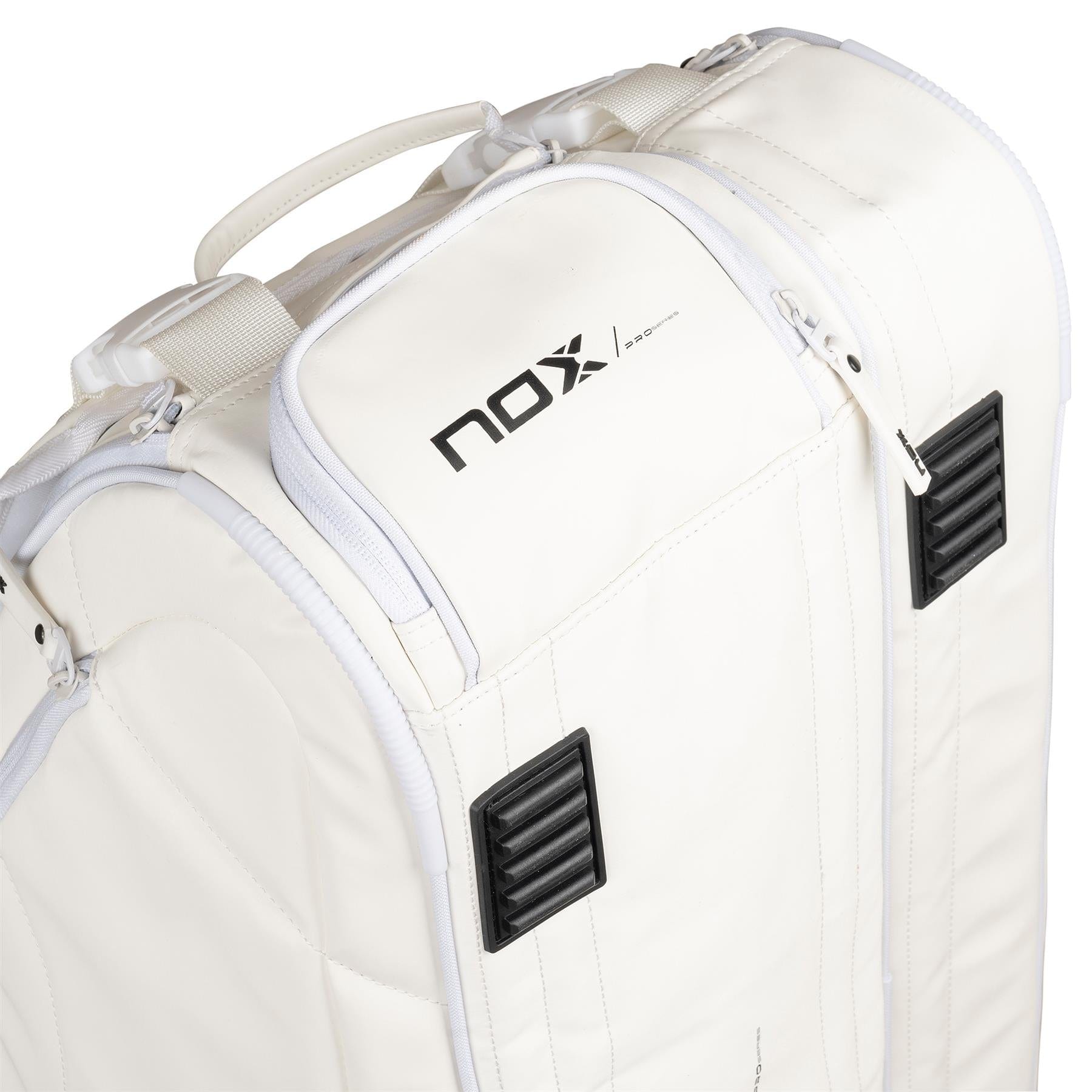 Close-up of the NOX Pro Series Padel Racket Bag in white, featuring a handle, black accents, "NOX" logo on top, 45L capacity, zippers, and textured black vents on the corners.