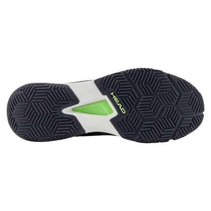 The image features the sole of the HEAD Motion Team Mens Padel Shoes in black with a hexagonal tread for 360-degree grip. It includes a white section with a green triangle at the center and "HEAD" printed boldly, offering superior lateral control on the court.