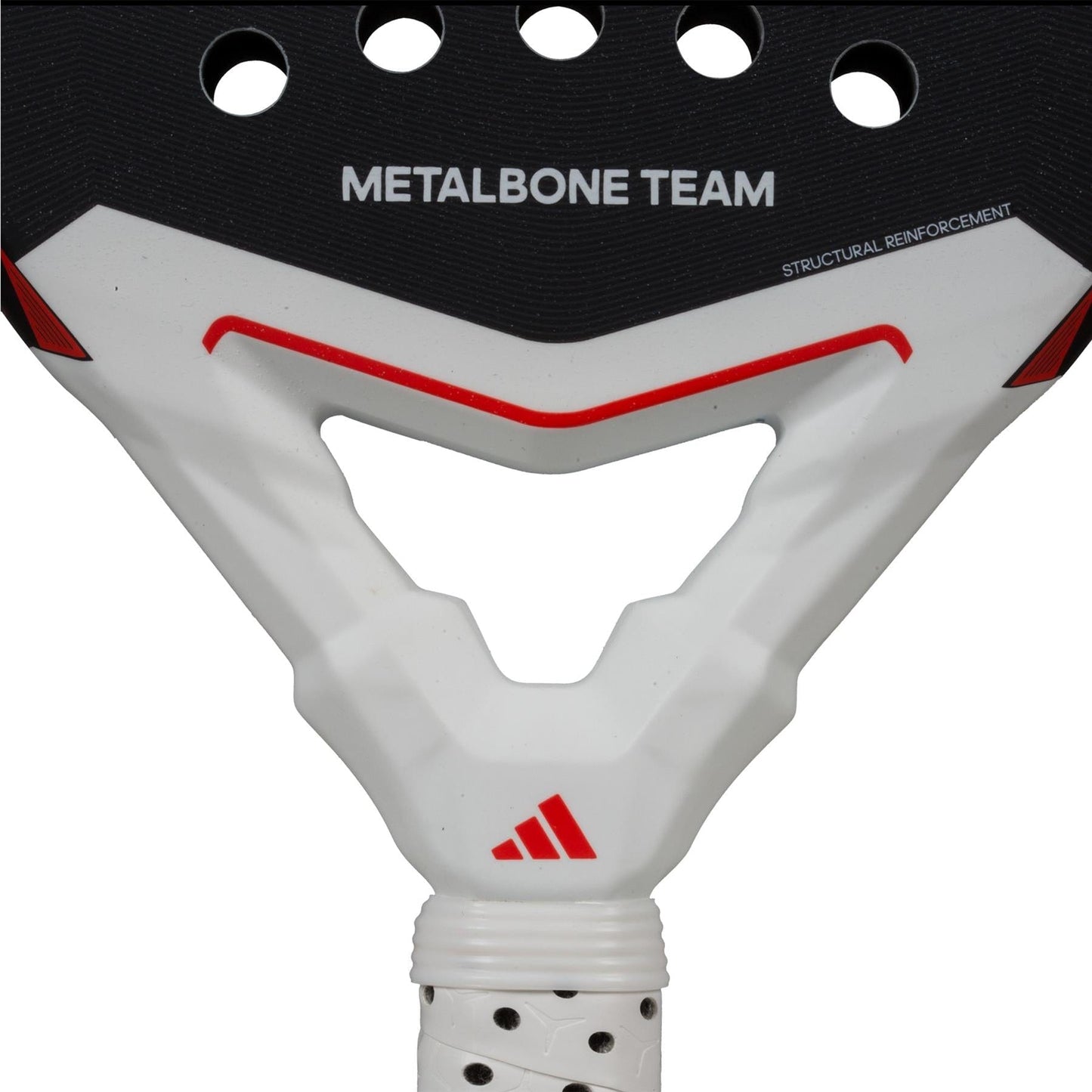 Close-up of the adidas Metalbone Team 3.4 padel racket, displaying "METALBONE TEAM" and "STRUCTURAL REINFORCEMENT" text. Black and white with red accents, it’s ideal for aggressive play—the adidas logo sits above the handle.