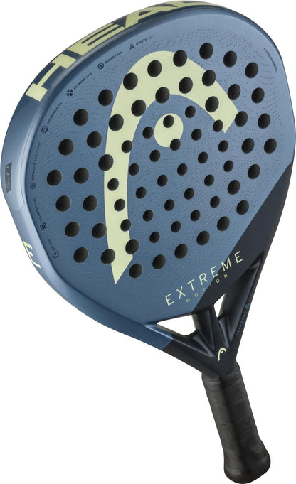 The HEAD Extreme Motion 2025 Padel Racket by HEAD features a blue and black design, bold logo, multiple round holes on the face, and a black grip handle for powerful performance.