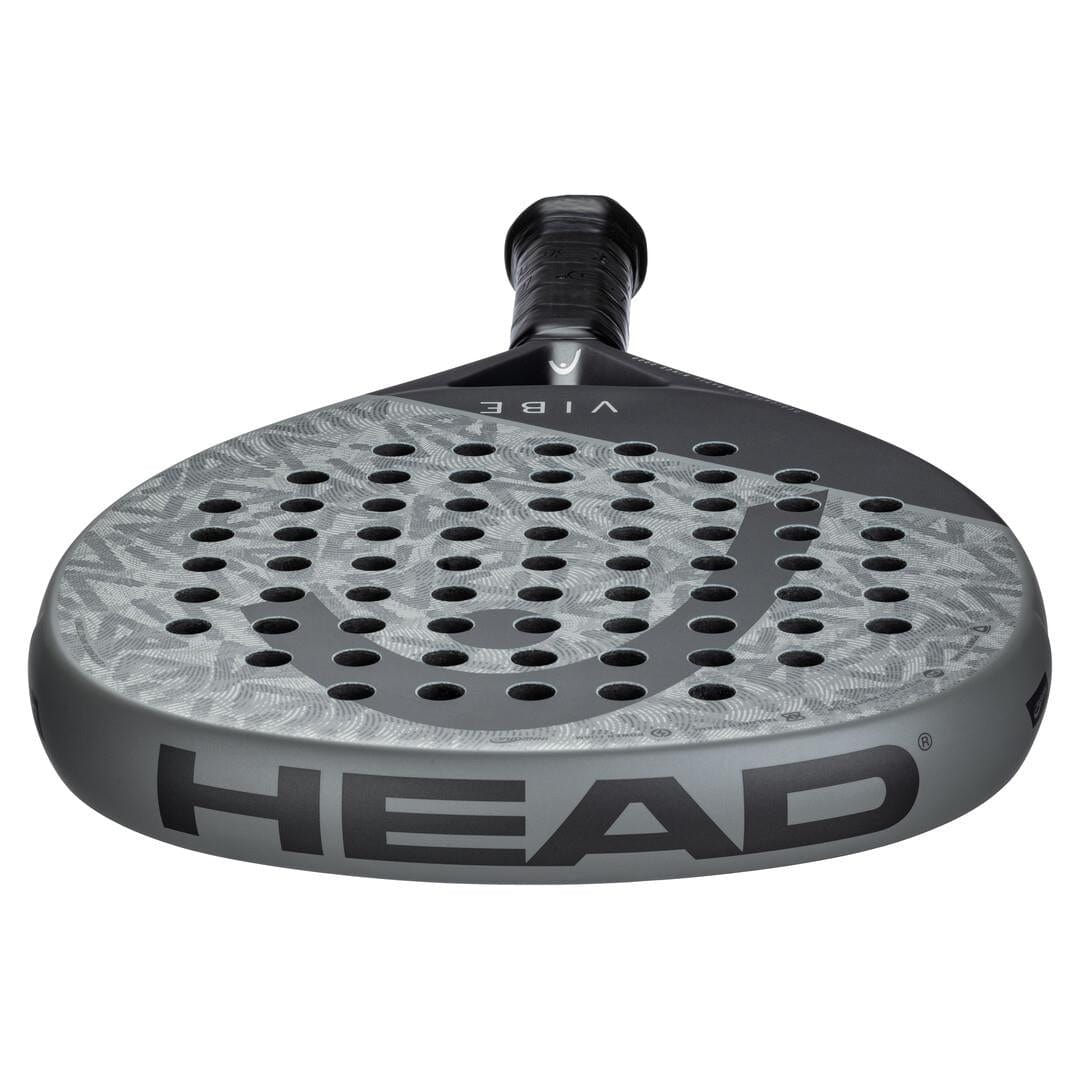 A close-up of the HEAD Vibe 2025 Grey / Black Padel Racket, showcasing its teardrop-shaped perforated grey face, black handle, and "VIBE" branding on the neck.