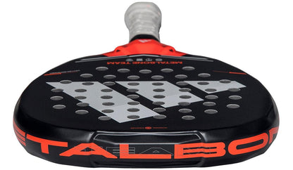 Close-up of the adidas Metalbone Team 2026 Padel Racket, showcasing a white grip, bold branding, large perforations, a central “W” logo, and Spin Blade Gritt technology for optimal spin and control.